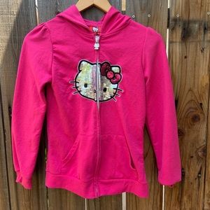 A hello kitty sweater